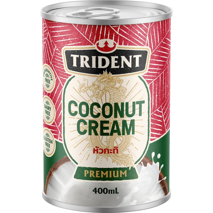 Creamy Trident Coconut Cream in a bowl, perfect for curries, desserts, and vegan recipes with a rich coconut flavor.