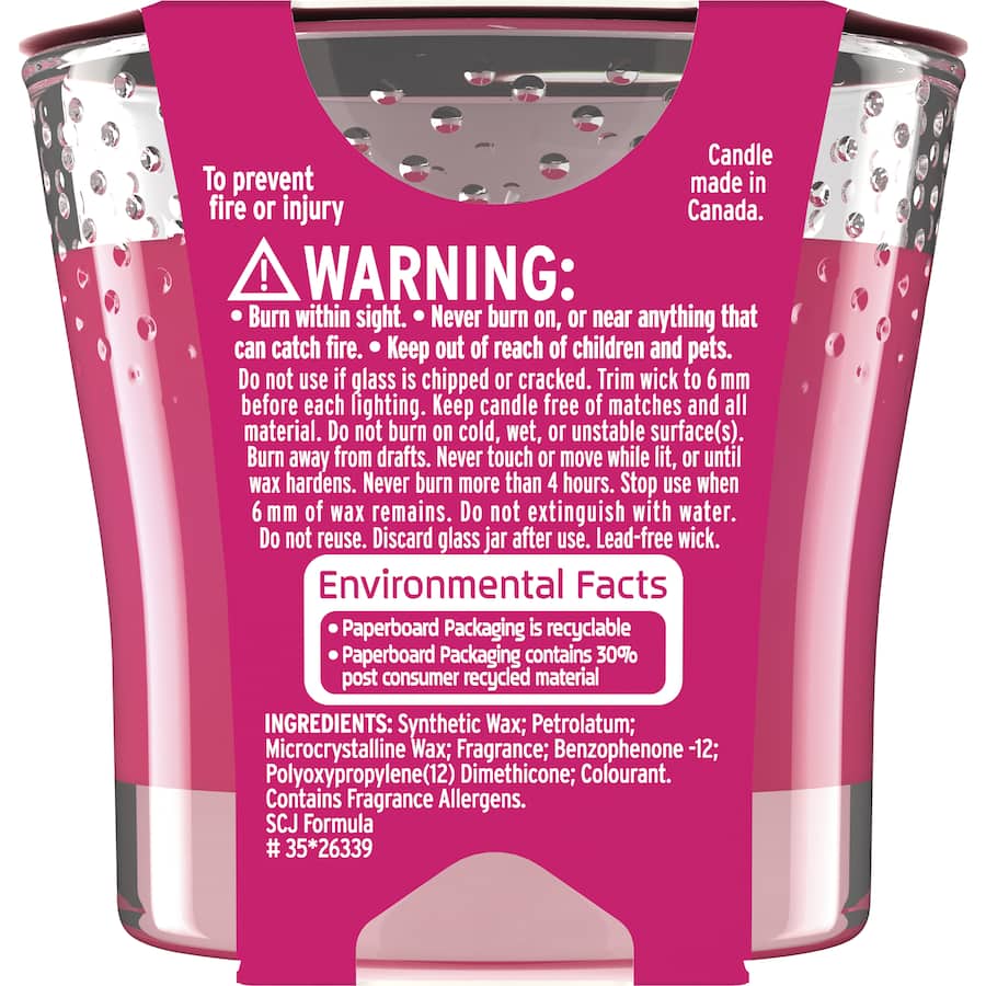 Glade Limited Edition candle in a stylish jar, infused with essential oils for a luxurious aromatic experience.