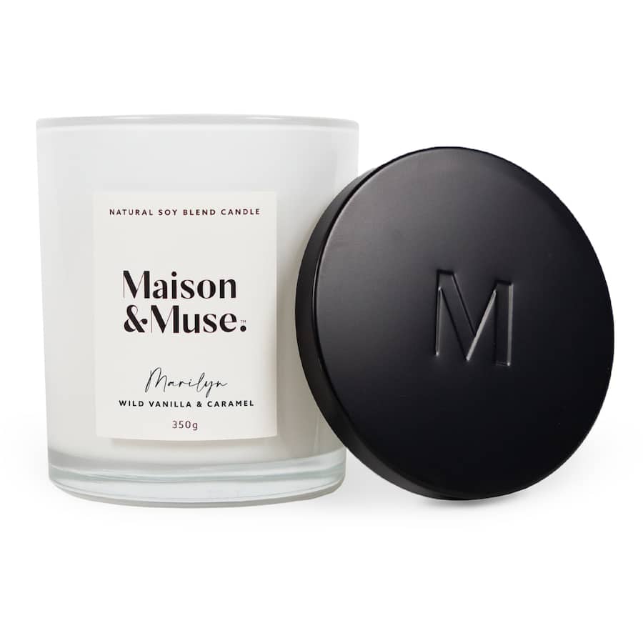 Luxurious Maison & Muse Vanilla & Caramel scented candle in a chic glass jar, delivering warmth with a 75-hour burn time.
