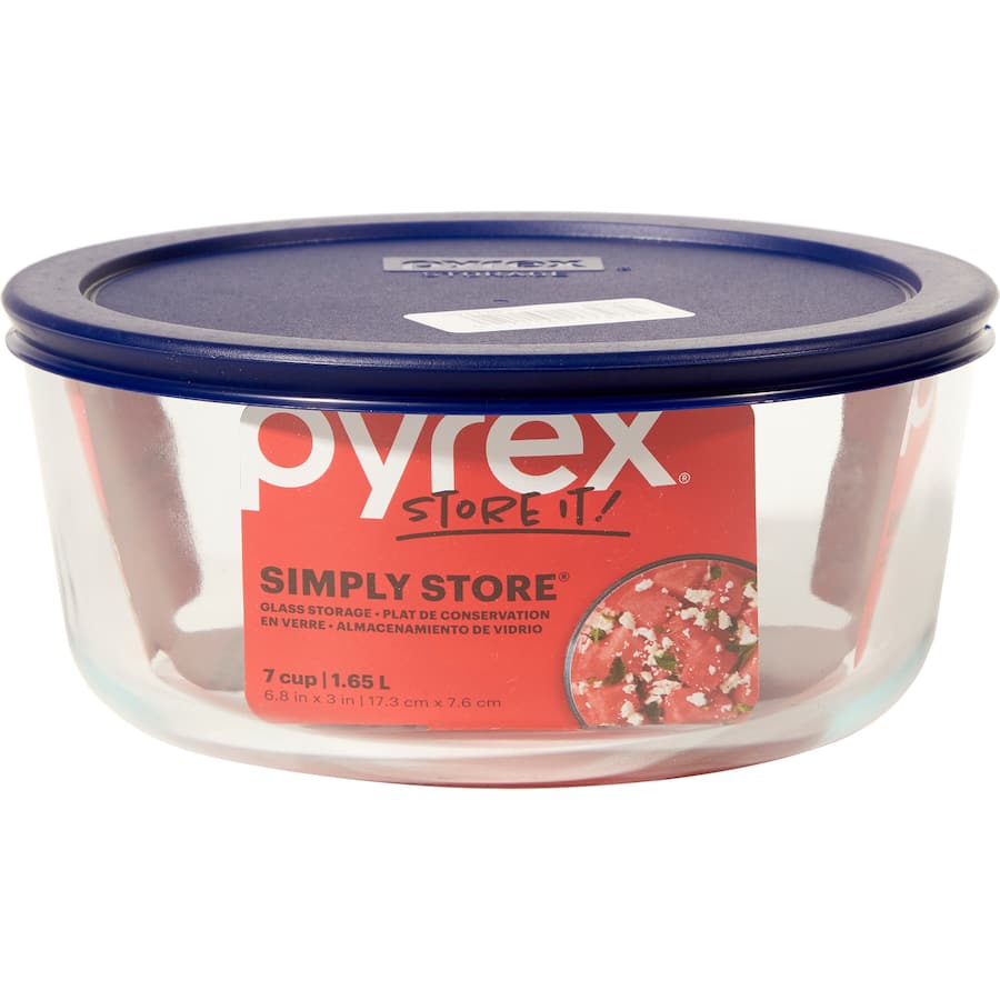 7-cup round Pyrex bowl with secure lid, ideal for food storage, microwave and dishwasher-safe, made of durable tempered glass.