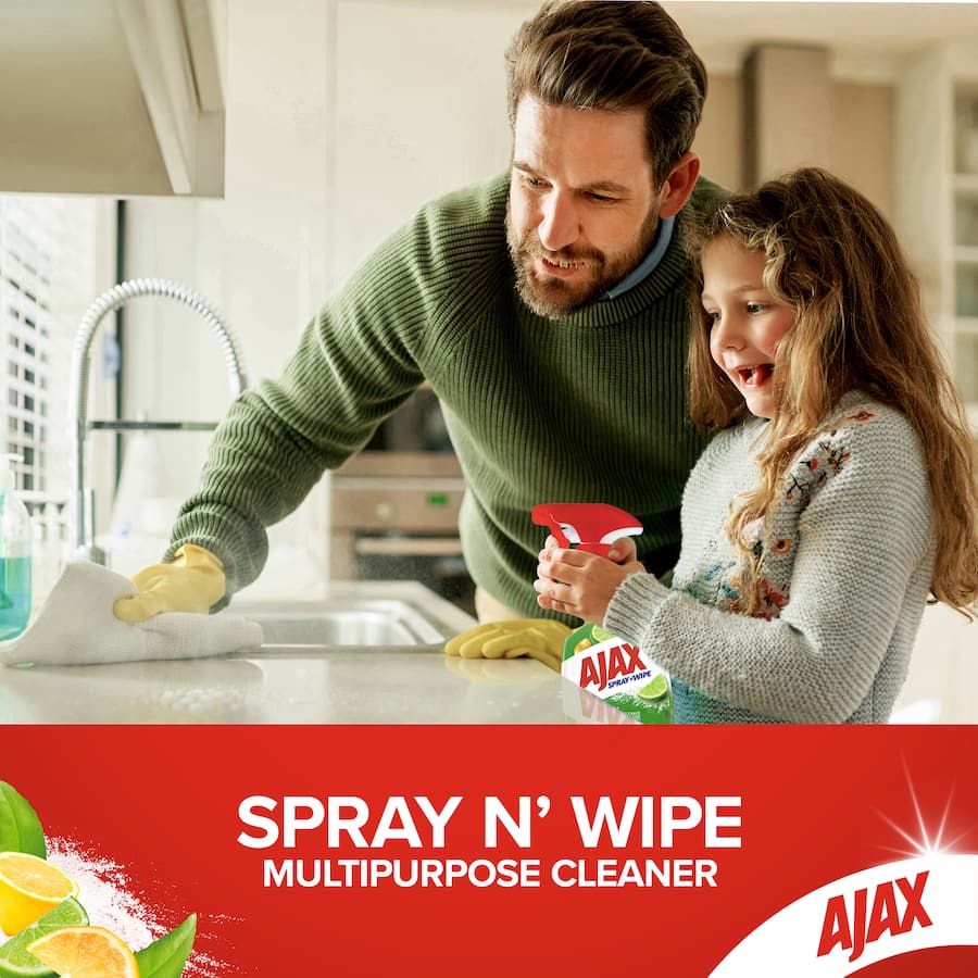 Ajax Spray N Wipe Kitchen Cleaner with Baking Soda, perfect for tough grease on stone surfaces, citrus scent, eco-friendly bottle.