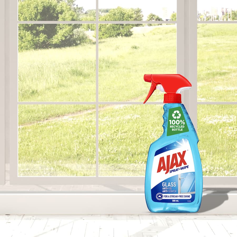 Ajax Spray N Wipe Glass Cleaner in a trigger spray bottle, delivering streak-free, anti-fog, and scratch-resistant shine.