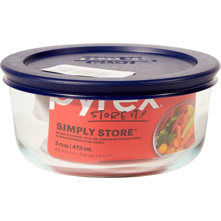 Round 2-cup Pyrex bowl with BPA-free lid, perfect for storing leftovers and meal prep, heat-resistant and dishwasher safe.