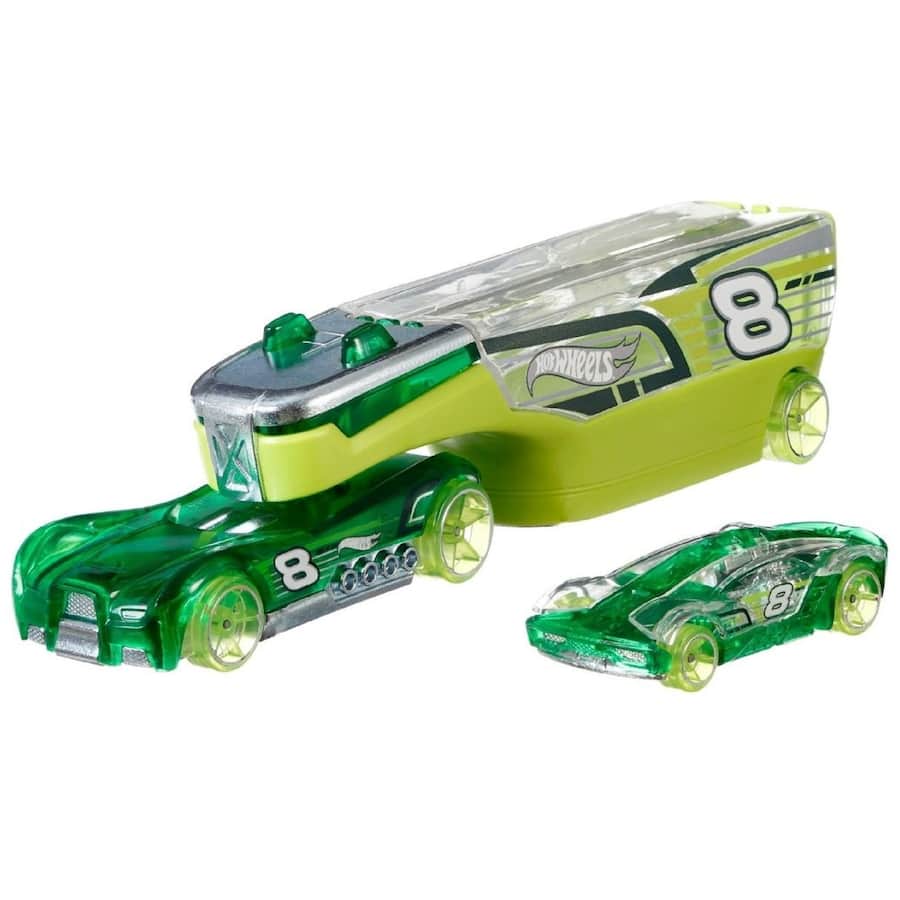 Hot Wheels Super Rig with vibrant hauling vehicle and 1:64 scale car, perfect for imaginative play and thrilling races.