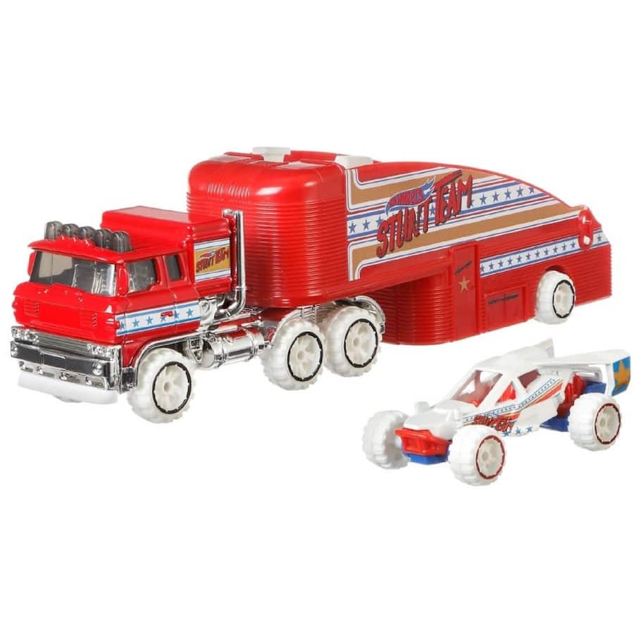 Hot Wheels Toys Super Rig - Assorted: colorful hauling rig with a 1:64 scale car for thrilling play and imaginative adventures.