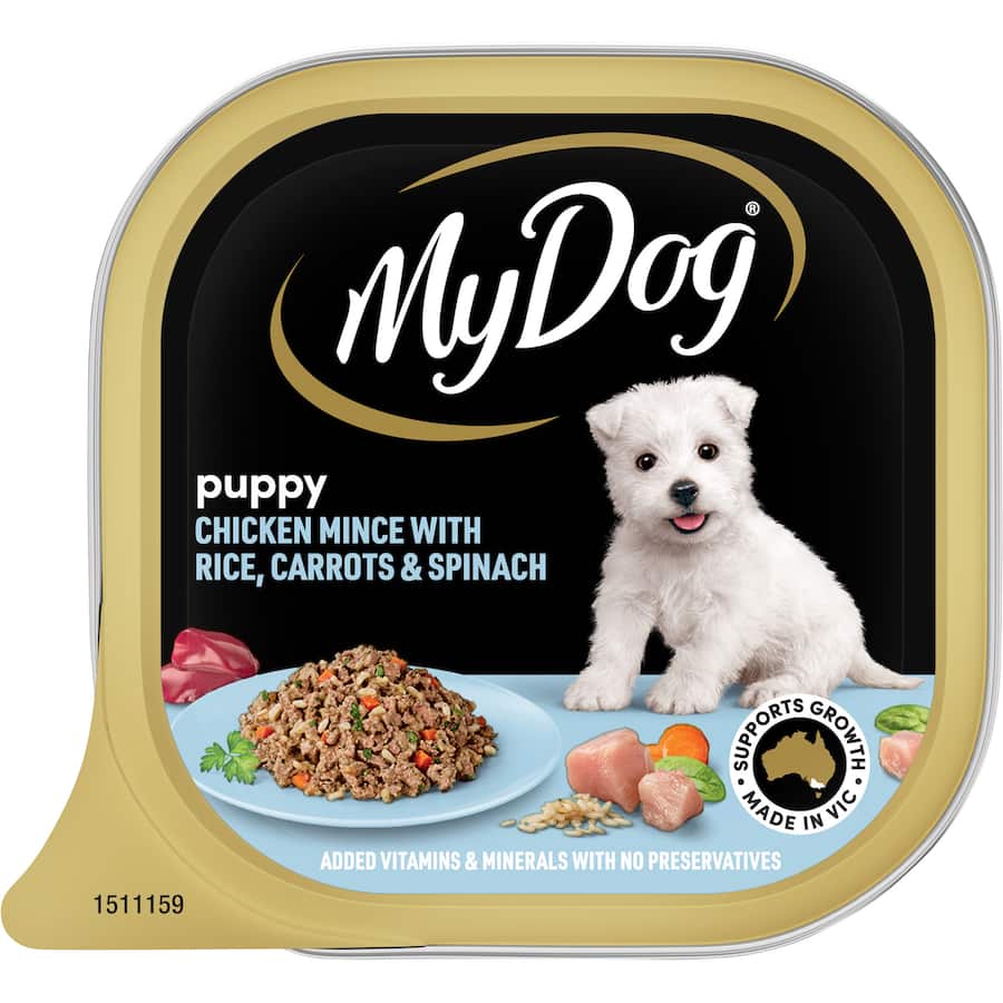Wet dog food tray featuring chicken, rice, carrot, and spinach for puppies' balanced nutrition and growth.
