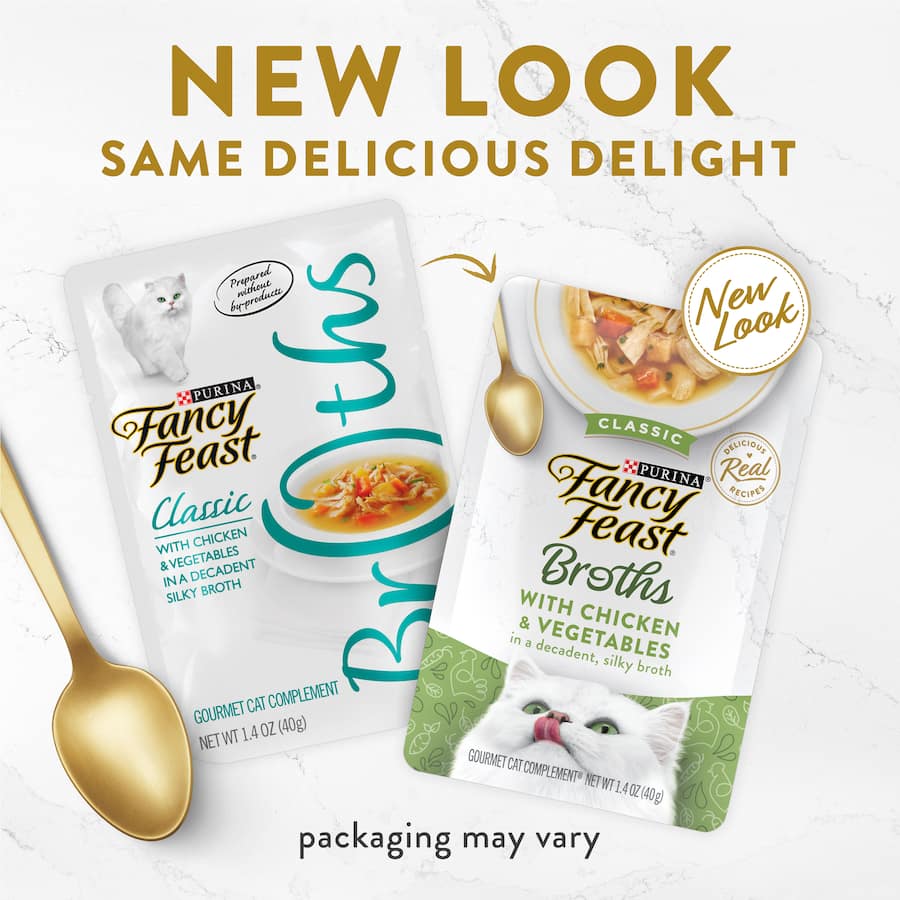 Fancy Feast Broths featuring tender chicken and vegetables in a silky, flavorful broth for a gourmet cat dining experience.