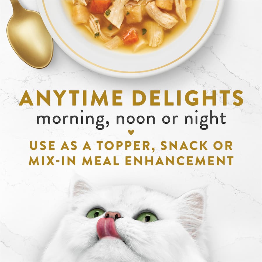Gourmet wet cat food with tender chicken and veggies in silky broth, free from artificial additives and fillers.