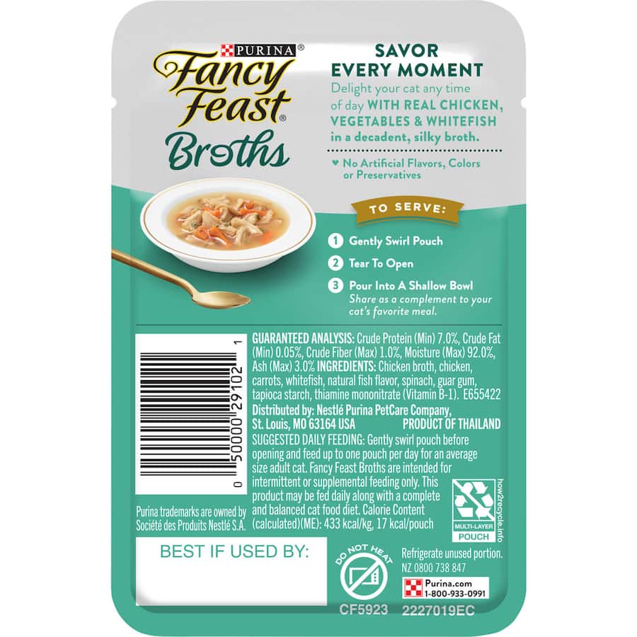 Gourmet wet cat food featuring chicken, whitefish, and veggies in a rich broth for discerning feline palates.