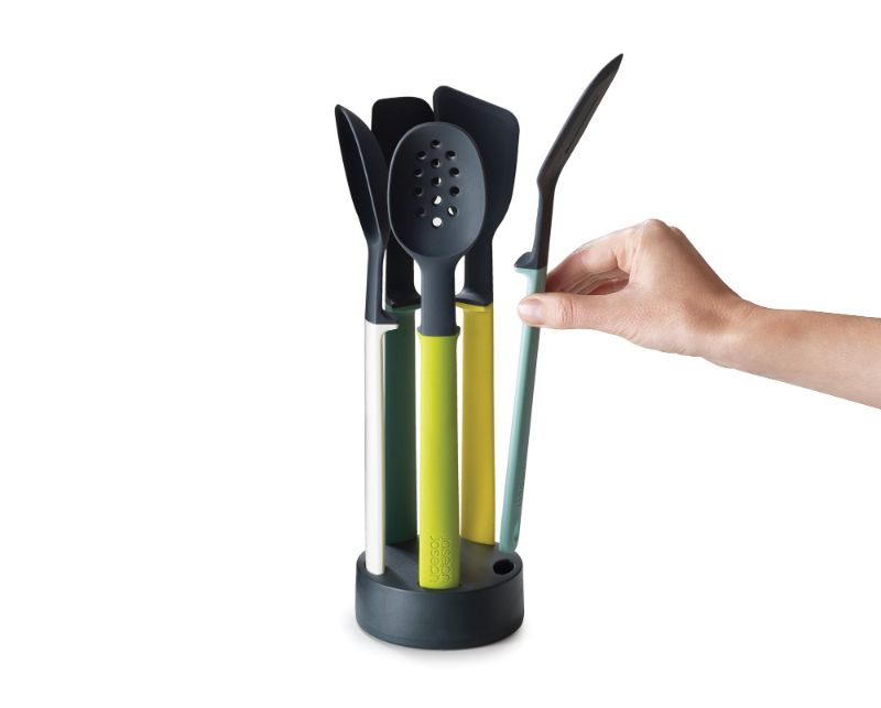 5-piece silicone utensil set with compact storage stand, heat-resistant tools, and hygienic design to reduce mess.