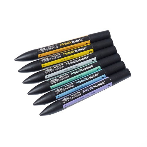 Winsor & Newton Metallic Marker Set - Set 6 features vibrant, water-based metallic markers with twin tips for versatile artwork.