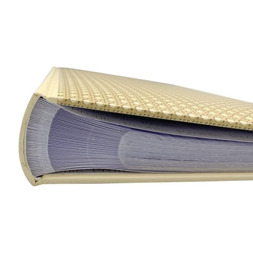 Boho Rattan photo album showcasing 500 4x6in photos in slip-in pockets, featuring a stylish rattan cover and durable design.