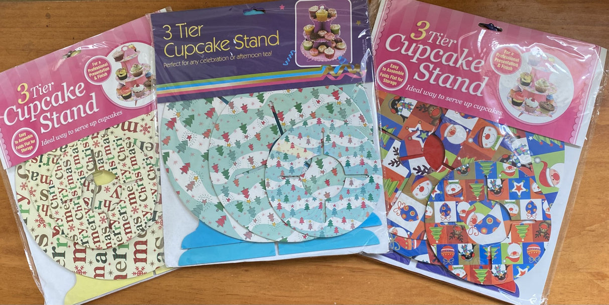 Three-tier Christmas cupcake stand set featuring assorted elegant designs, perfect for festive dessert displays.
