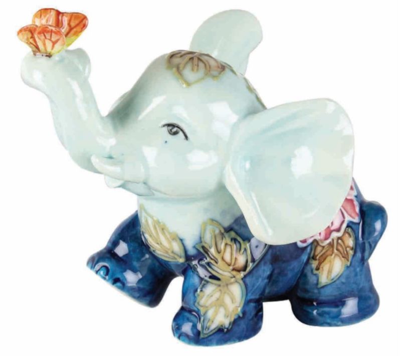 Colorful 10cm elephant ornament with summer flowers and a bird, perfect for playful home decor and seasonal charm.