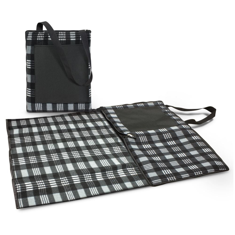 Extra-large Dakota Picnic Blanket with soft poly-fleece, waterproof backing, and convenient carry handle for outdoor use.
