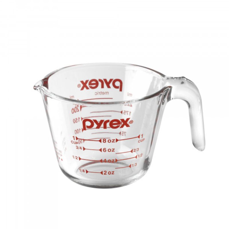 Clear Pyrex 1 Cup Measuring Jug (250ml) with ergonomic handle, durable glass, and easy-to-read measurement markers.