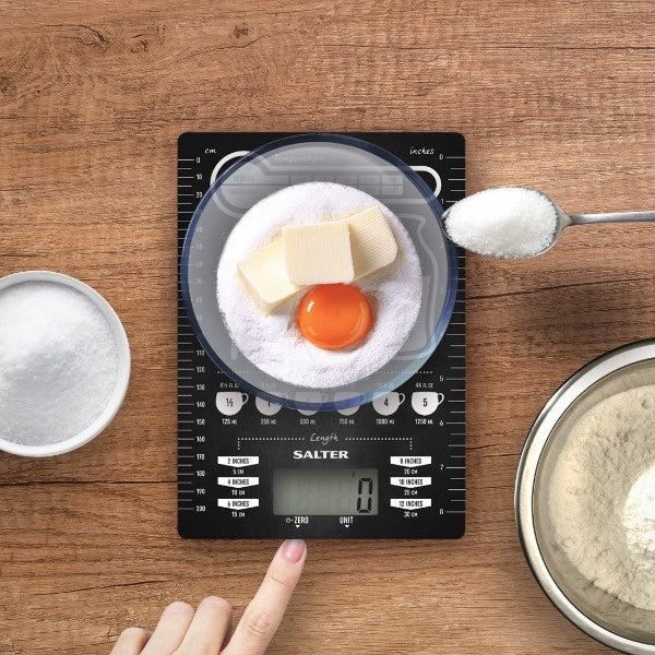 Salter Electronic Kitchen Scale 1171CNDR with glass platform, large display, and unit conversion for precise cooking.