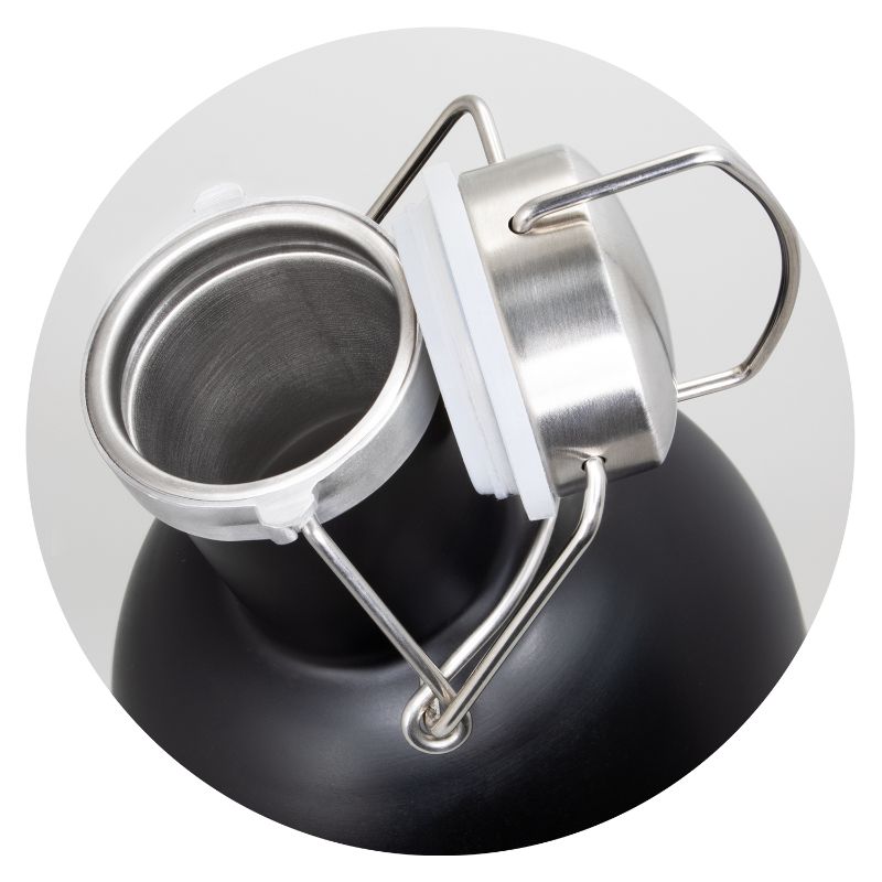 Black stainless steel beer growler with secure lid, perfect for keeping drinks fresh on-the-go, presented in a sleek gift box.