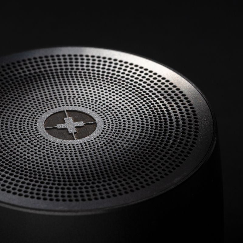Sleek black Swiss Peak Bass Speaker with robust 3W output, built-in driver, and stylish stainless steel design.
