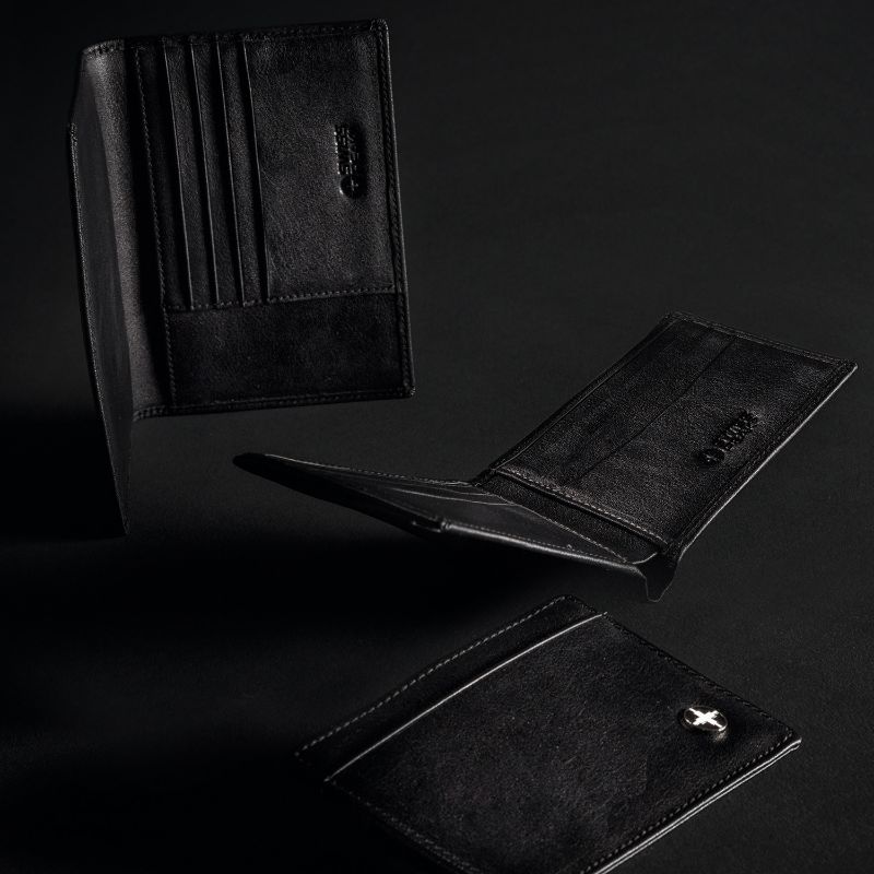 Black Swiss Peak Anti Skimming Wallet, featuring 6 card slots, premium PU leather, and secure anti-skimming technology.