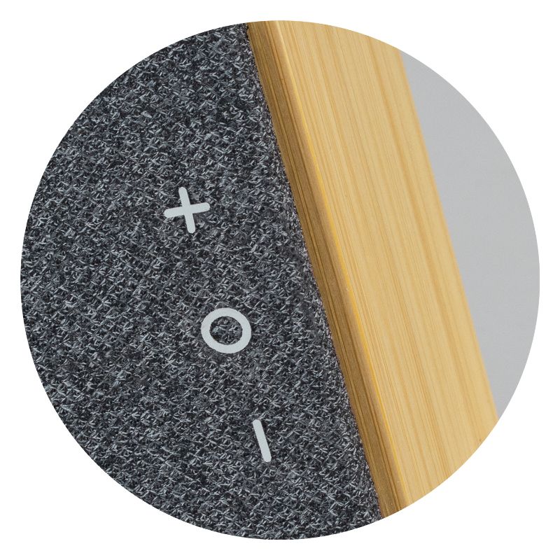Eco-friendly 5W Bluetooth speaker crafted from bamboo, featuring a heather polyester front for stylish sound on-the-go.