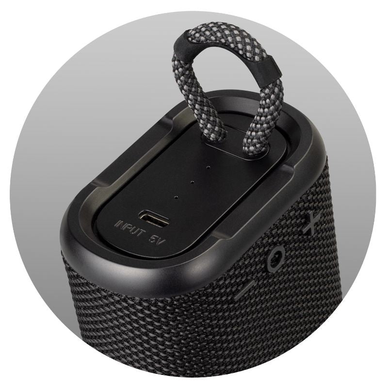 Compact black outdoor Bluetooth speaker Loki with IPX7 water resistance, 5W power, and 3-hour playtime for adventures.
