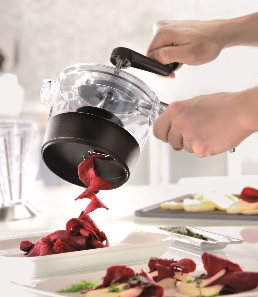 Spiral Slicer by GEFU transforms vegetables into creative spirals with adjustable widths, minimizing waste for healthy meals.