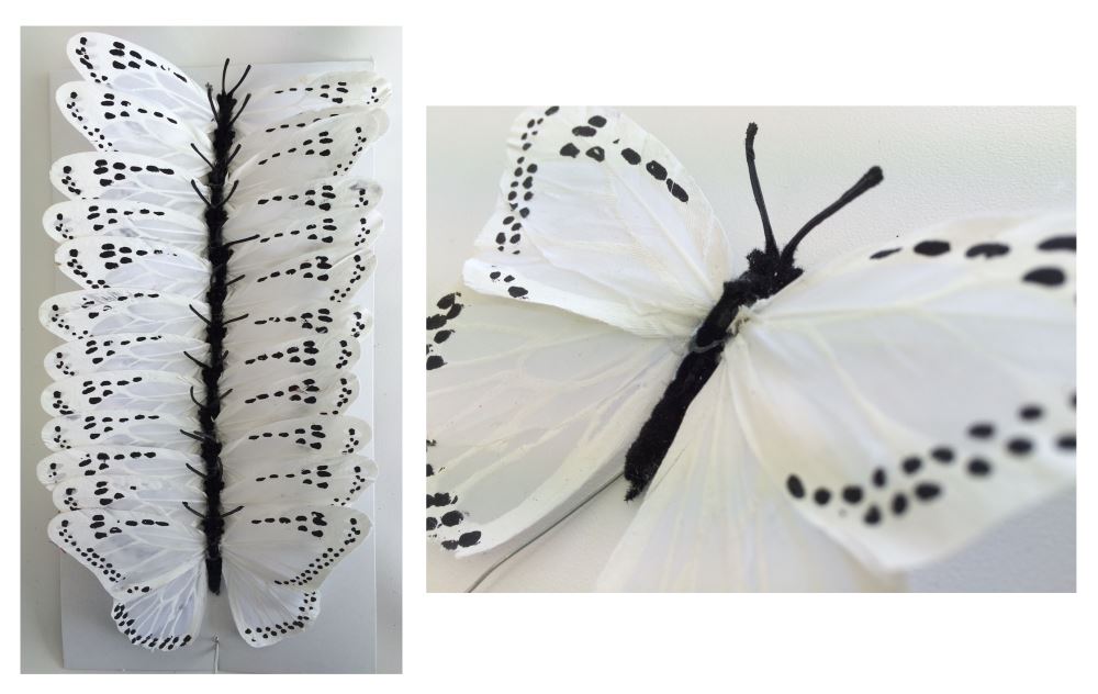 Vibrant set of 12 artificial butterflies with feather bodies and bendable wires for versatile decoration and crafts.