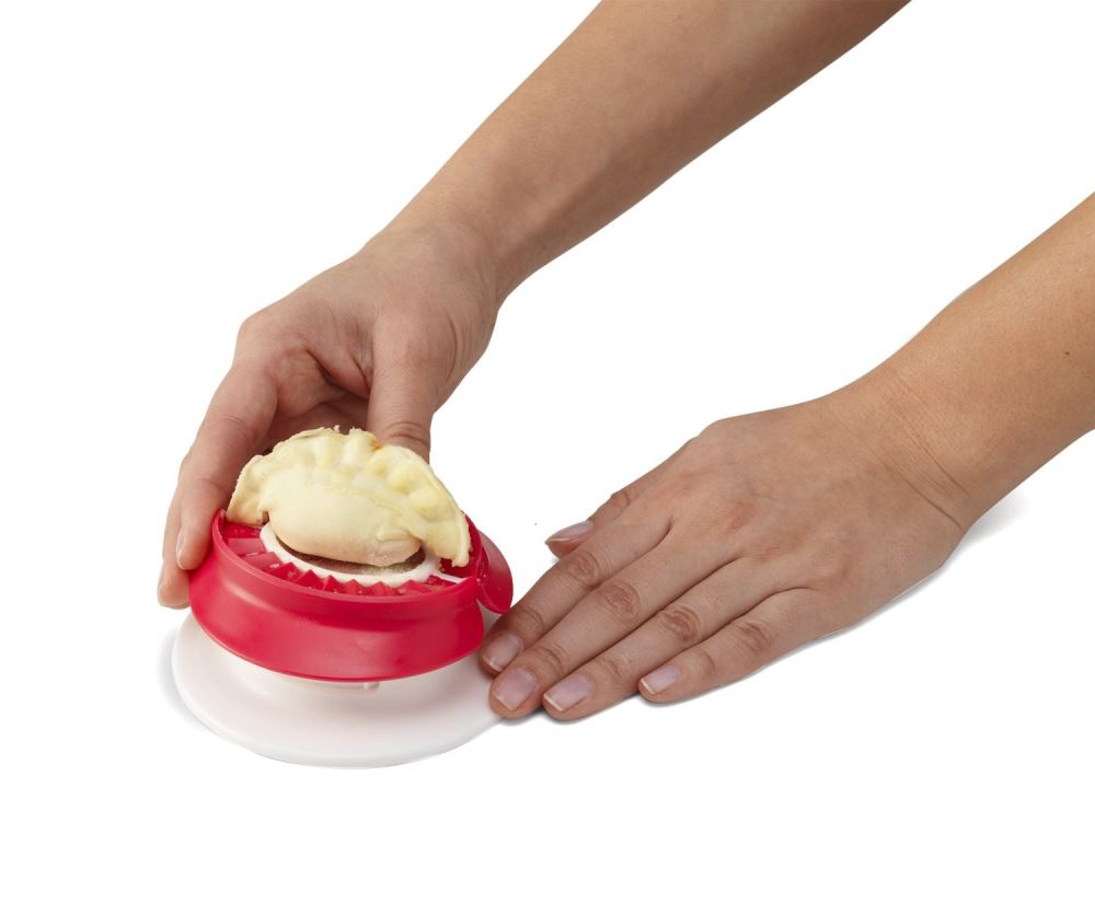 Compact pocket maker for homemade appetizers with easy filling and sealing for bite-sized snacks.