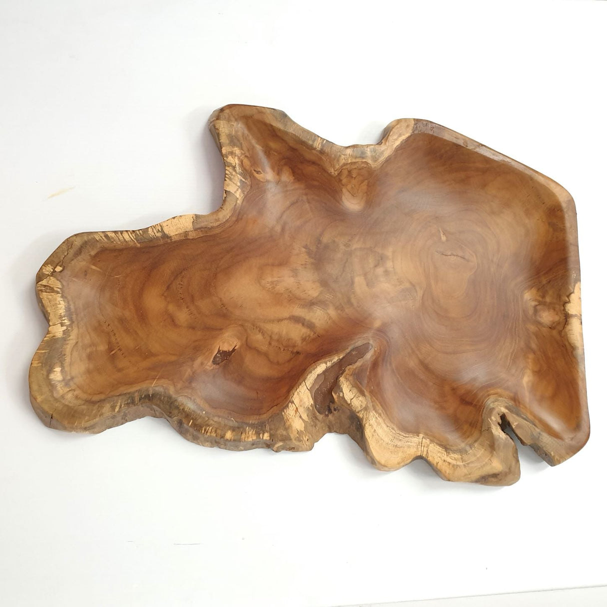 Medium teak rustic platter measuring 45x50x3cm, perfect for serving appetizers or as a decorative piece.