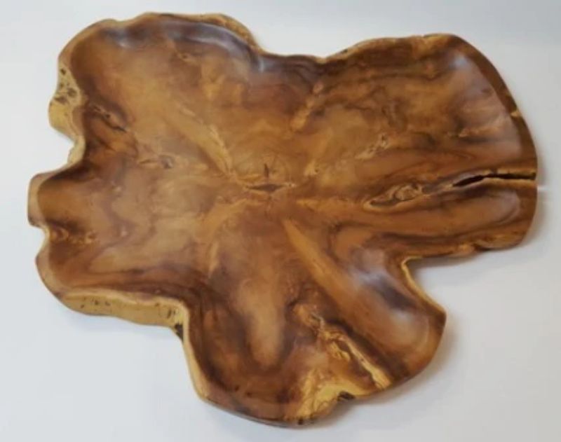 Handcrafted large teak rustic platter, ideal for serving appetizers and showcasing natural beauty, measuring 60x60x4cm.
