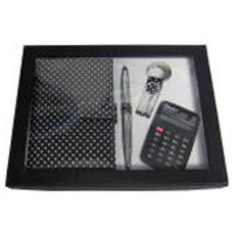 Chic black polka dot stationery set with diary, pen, keyring, and calculator, perfect for office or study desk.