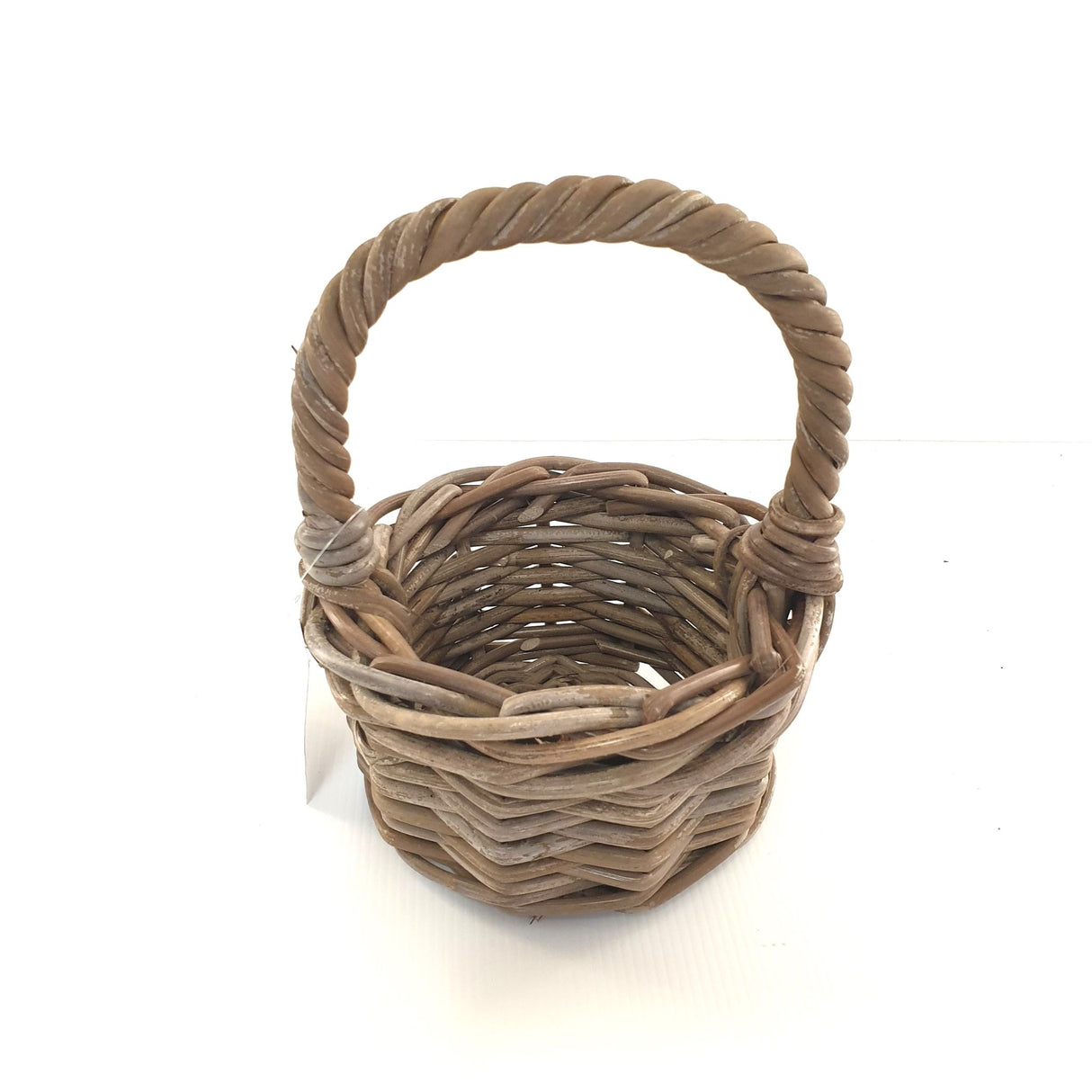Child's round cane basket, eco-friendly wicker storage for toys and clothes, 15x9x18cm, perfect for any decor style.