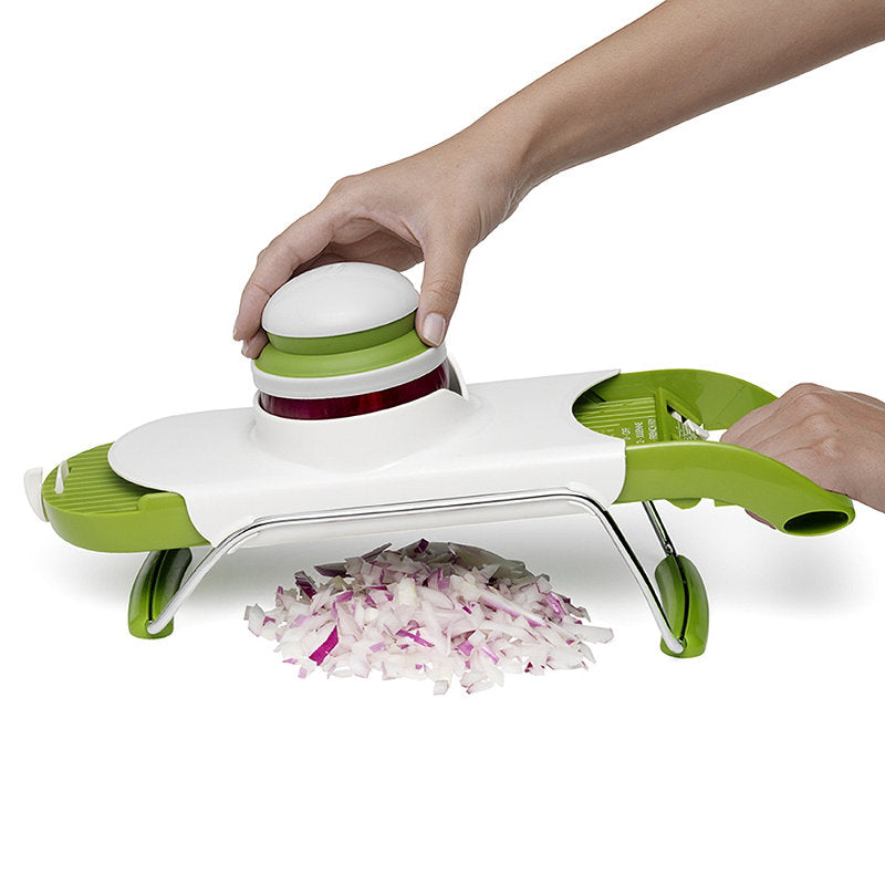 Safety-focused Chef'n Pull'n Slice mandoline with adjustable thickness and multiple blade options for versatile vegetable slicing.