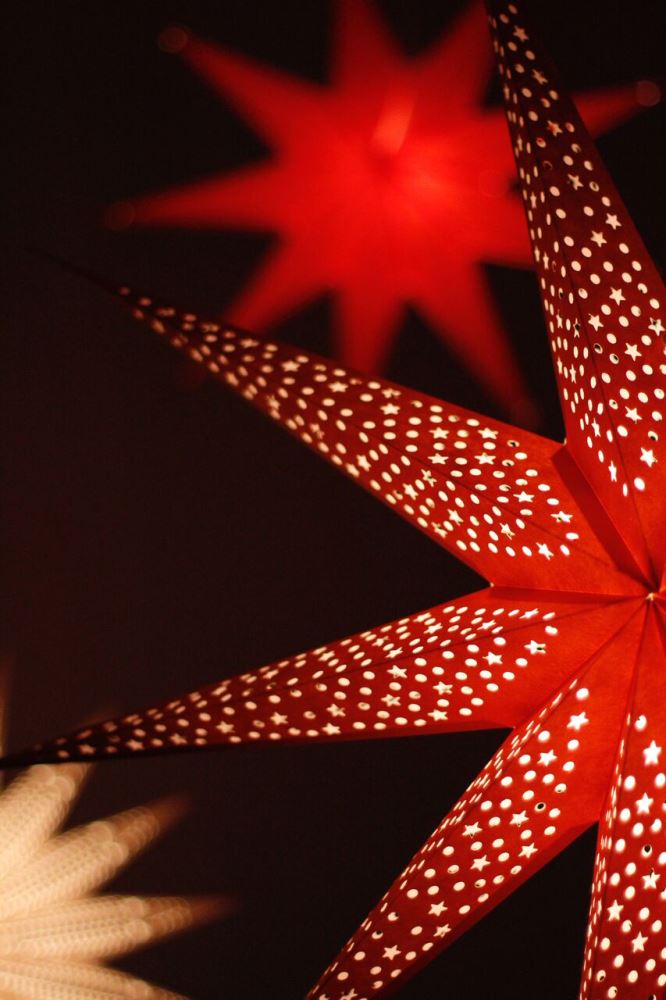 Handmade orange star lantern lamp shade, 90cm diameter, crafted from thick paper for a warm, inviting glow in any space.