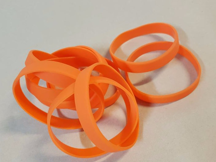 Vibrant orange silicone wristbands in a pack of 10, perfect for events, fundraisers, and promotional activities.