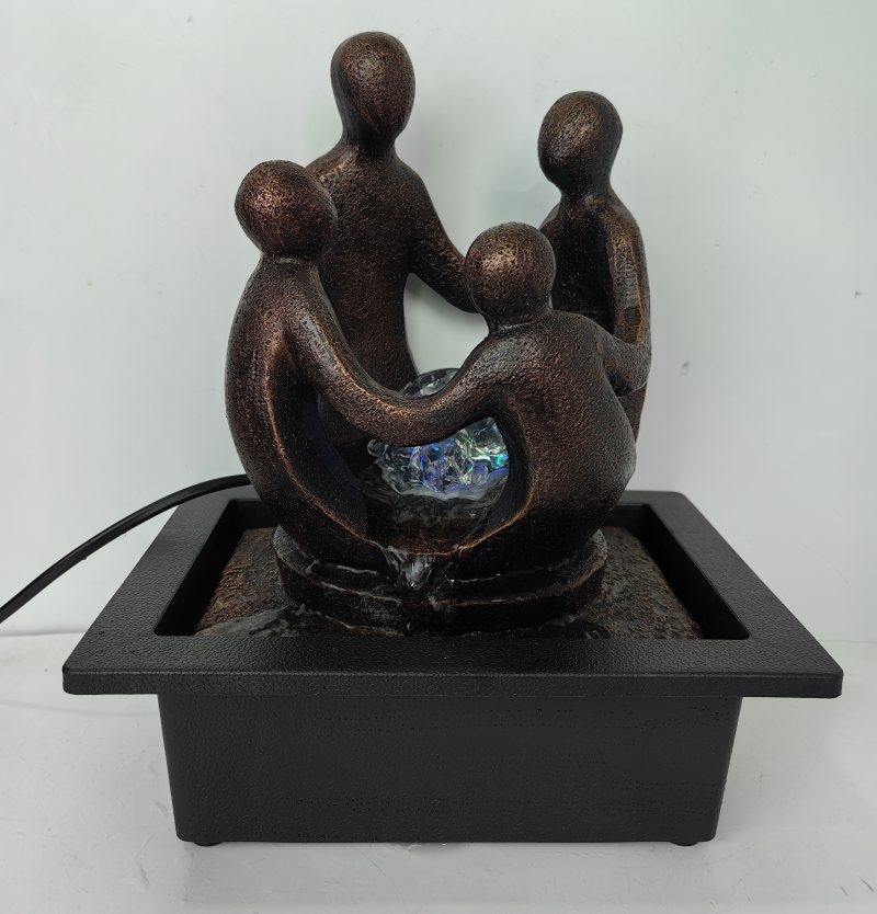 Circle of Friends water feature with rolling ball, 18x18x28cm, enhances gardens with soothing sounds and elegant design.