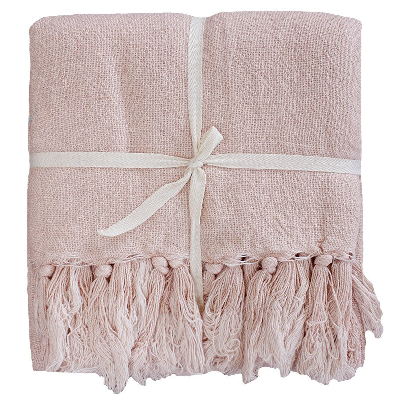 Lightweight Evening Pink throw blanket in linen/cotton blend, perfect for adding modern elegance and comfort to any room.