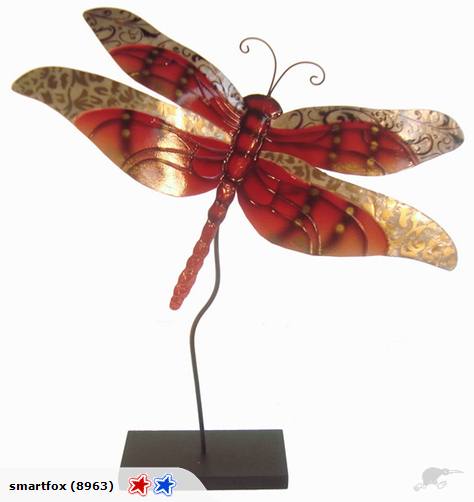 Brightly colored capiz shell dragonfly ornament on a sturdy tin backing, measuring 31cm x 33cm, perfect for home decor.