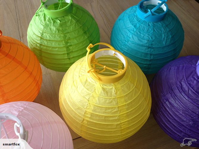 20cm green paper lantern with LED light, perfect for events; hung or table centerpiece, battery-powered and portable.