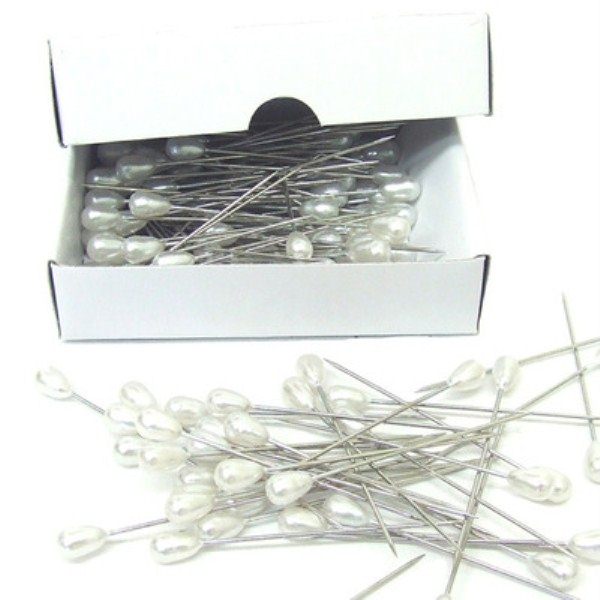 Elegant set of 144 pearl head pins, 38mm, perfect for securing corsages and floral arrangements discreetly.