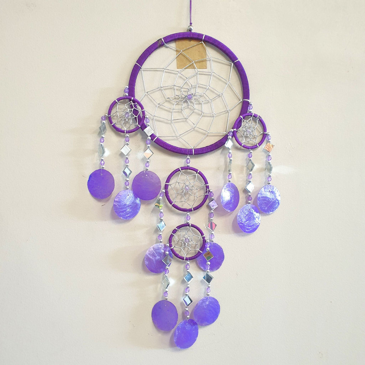 Purple Dream Catcher Mirror Shell Chimes with beads and shells, perfect for enhancing decor and inviting positive energy.