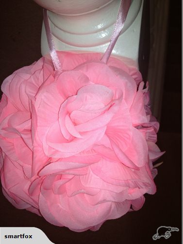 Light pink silk rose ball with hanging ribbon, perfect for weddings and celebrations, measuring 15cm in diameter.