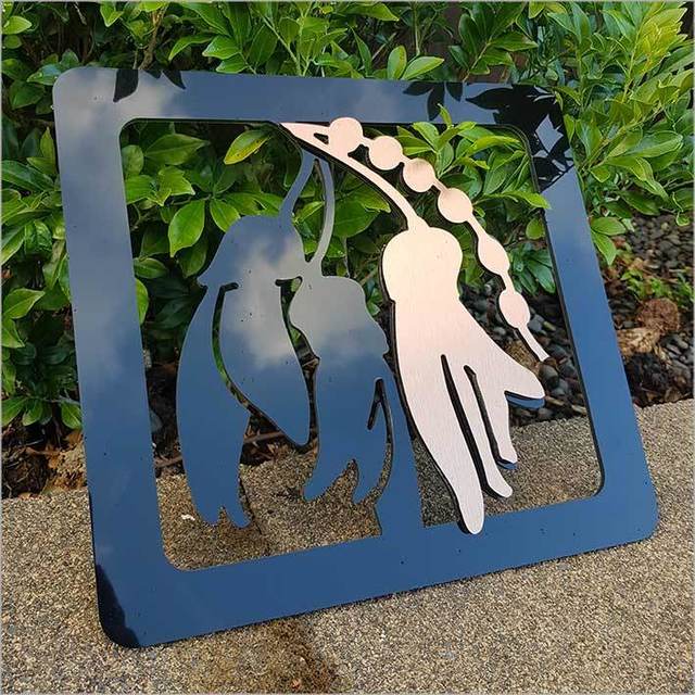 Two-tone Kowhai flower wall art panels in brushed copper, perfect for indoor/outdoor decor, embodying New Zealand's beauty.