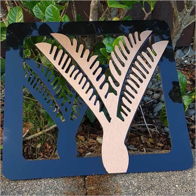 Two-tone Nikau art panels in brushed copper and black, showcasing Kiwiana style for indoor/outdoor decor, 300mm tall.