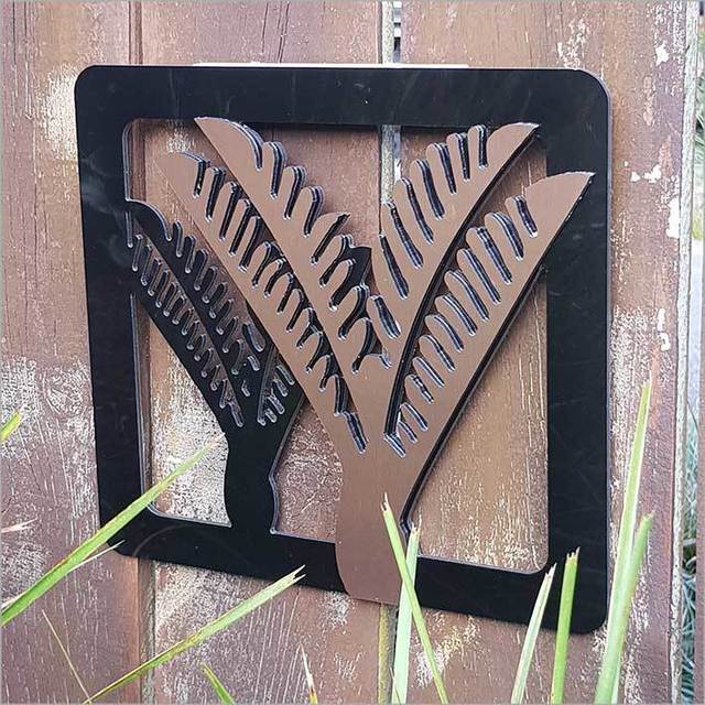 Two-tone Nikau art panels in brushed copper and black, perfect for indoor or outdoor Kiwiana-inspired decor.