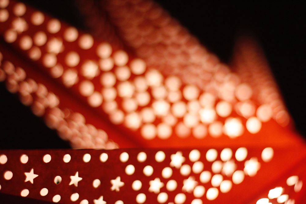 Handmade 90cm orange star lantern lamp shade, perfect for adding warm ambiance to any space, ideal for decor or themed parties.