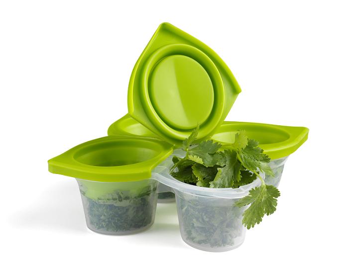 Transparent herb freezer tray allowing you to preserve and pop out flavor-packed herb cubes for year-round cooking.