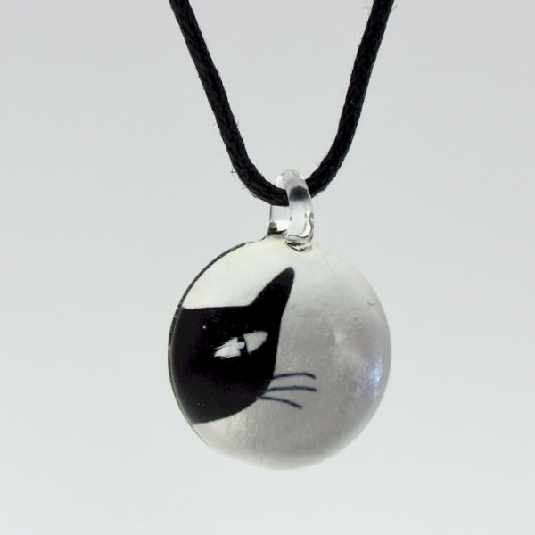 Handcrafted 2 cm round art glass pendant featuring a cheeky cat, with an adjustable cord necklace from 42 to 86 cm.