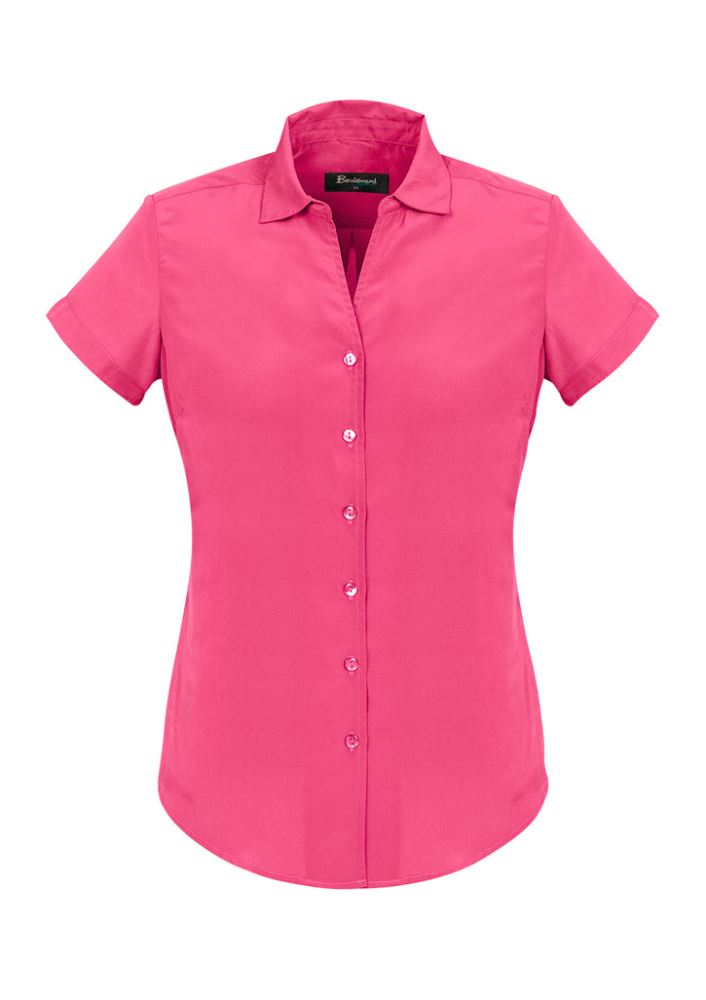 Melon short sleeve shirt for women, featuring a semi-fitted style and soft polyester for all-day comfort and versatility.